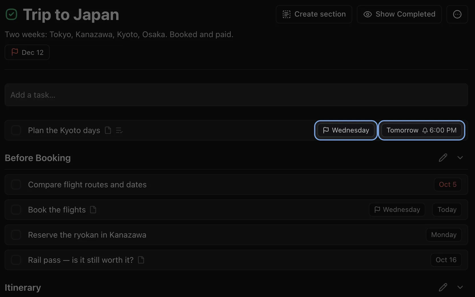 A task row in the Trip to Japan project with two chips highlighted: a flag for its deadline on Wednesday, and its start date, tomorrow, with a 6:00 PM reminder.